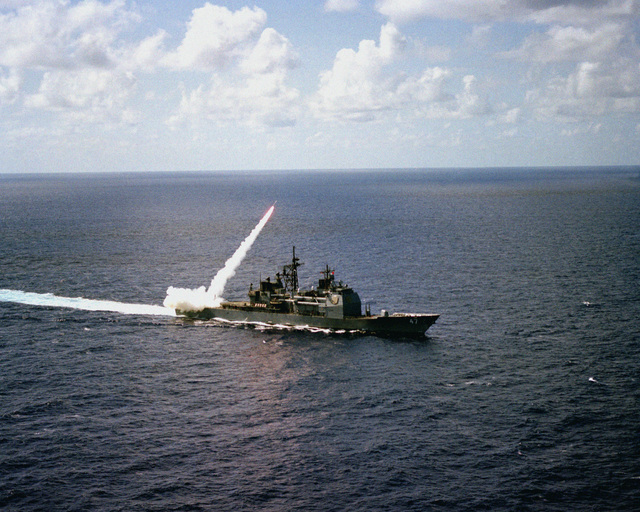 A Standard II missile is launched from the Aegis guided missile cruiser ...