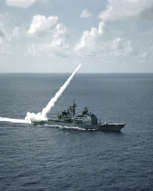 A Standard II missile is launched from the Aegis guided missile cruiser ...