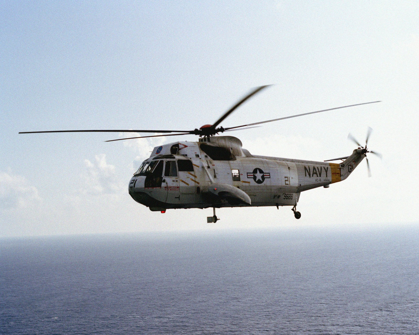 An air-to-air left front view of an SH-3G Sea King helicopter from ...