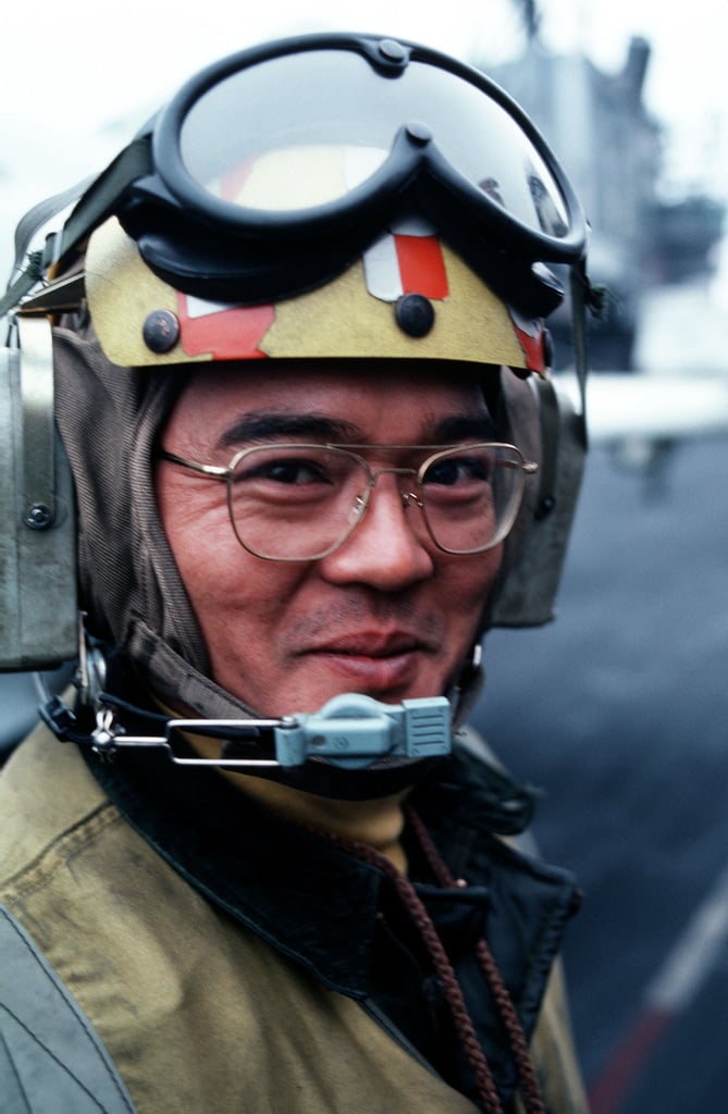 A Flight Deck Crewman Aboard The Aircraft Carrier USS MIDWAY CV 41 During CINCPAC Exercise