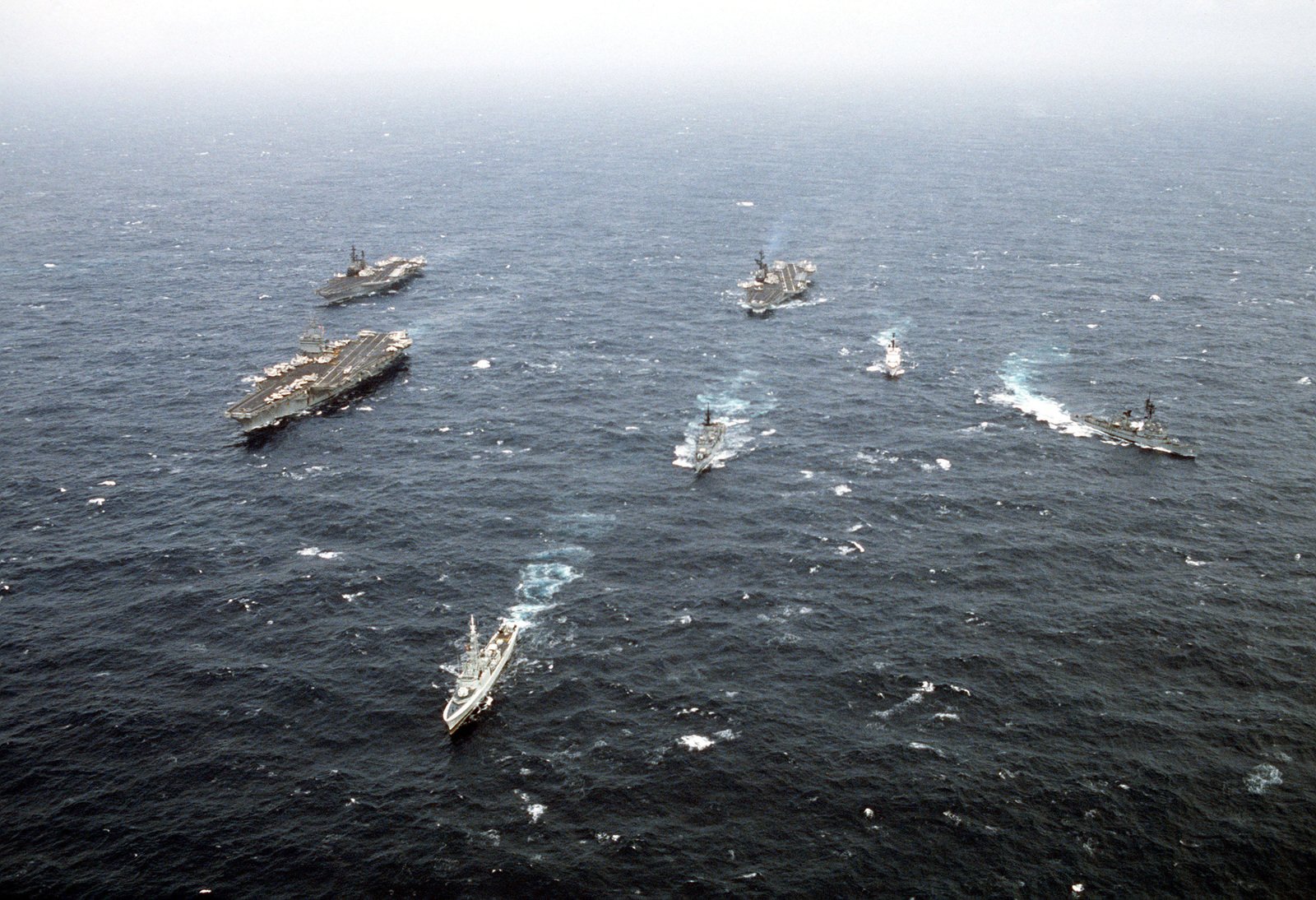 A port bow view of the nuclear-powered aircraft carrier USS ENTERPRISE ...