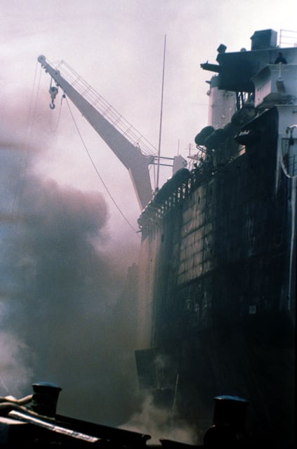 A view from Pier 4 of the Naval Station, of a fire that started in a ...