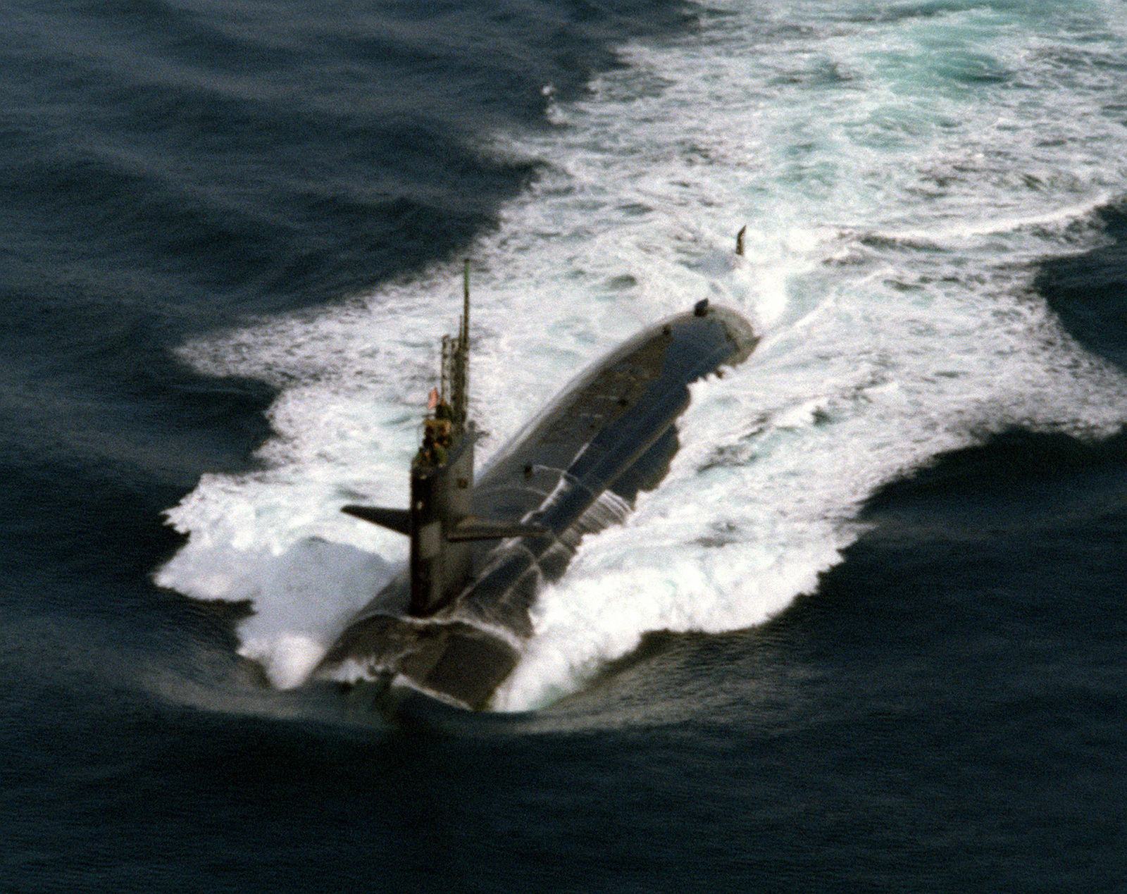 An aerial port bow view of a Sturgeon class nuclear-powered attack ...