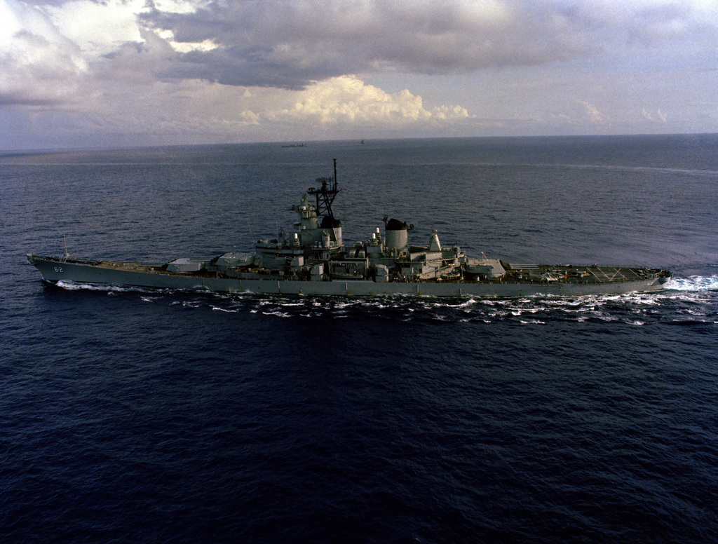 A port beam view of the battleship USS NEW JERSEY (BB-62) underway ...