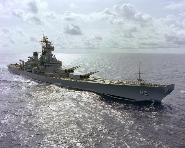 A starboard bow view of the battleship USS NEW JERSEY (BB-62) underway ...