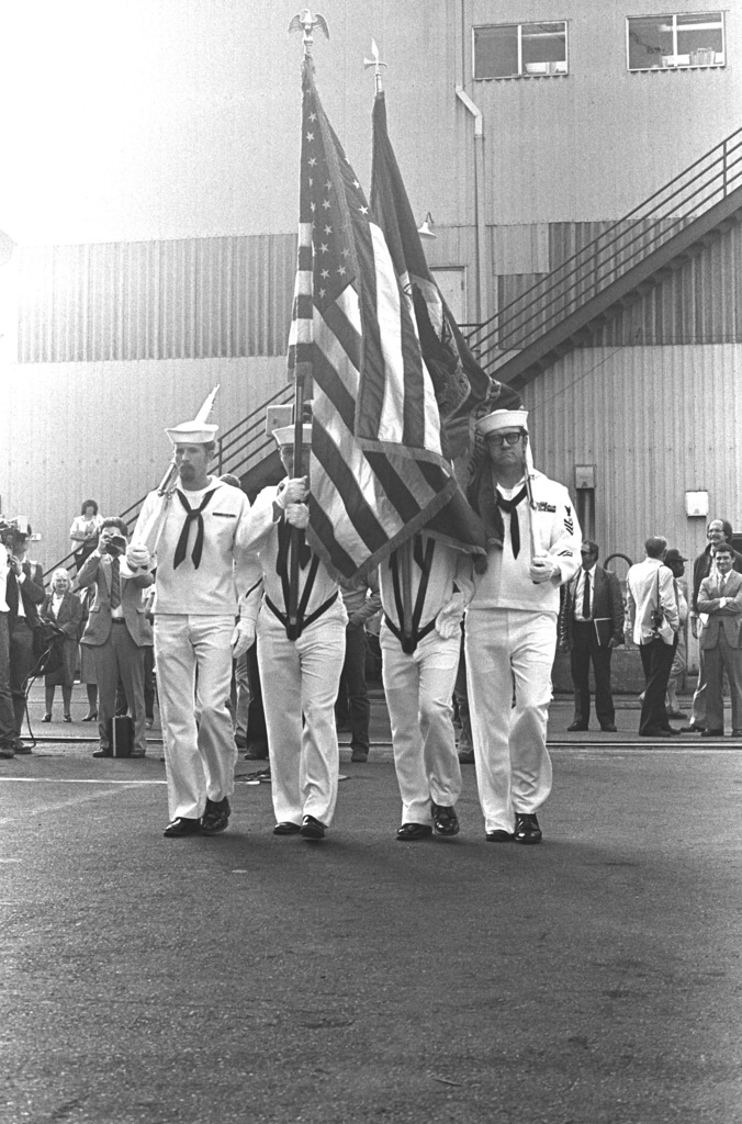 https://cdn10.picryl.com/photo/1983/07/11/a-navy-color-guard-participates-in-the-launching-ceremony-for-the-ocean-surveillance-73fd2e-1024.jpg