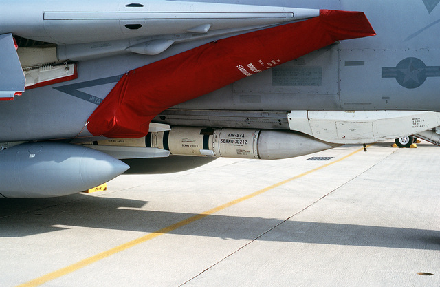 A Close-up View Of An AIM-54A Phoenix Air-to-air Missile Mounted On The ...