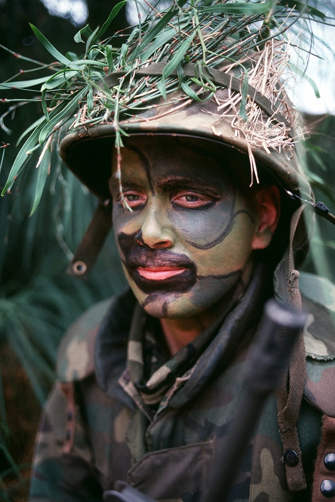 A member of the 24th Marine Amphibious Unit (MAU) wears camouflage ...