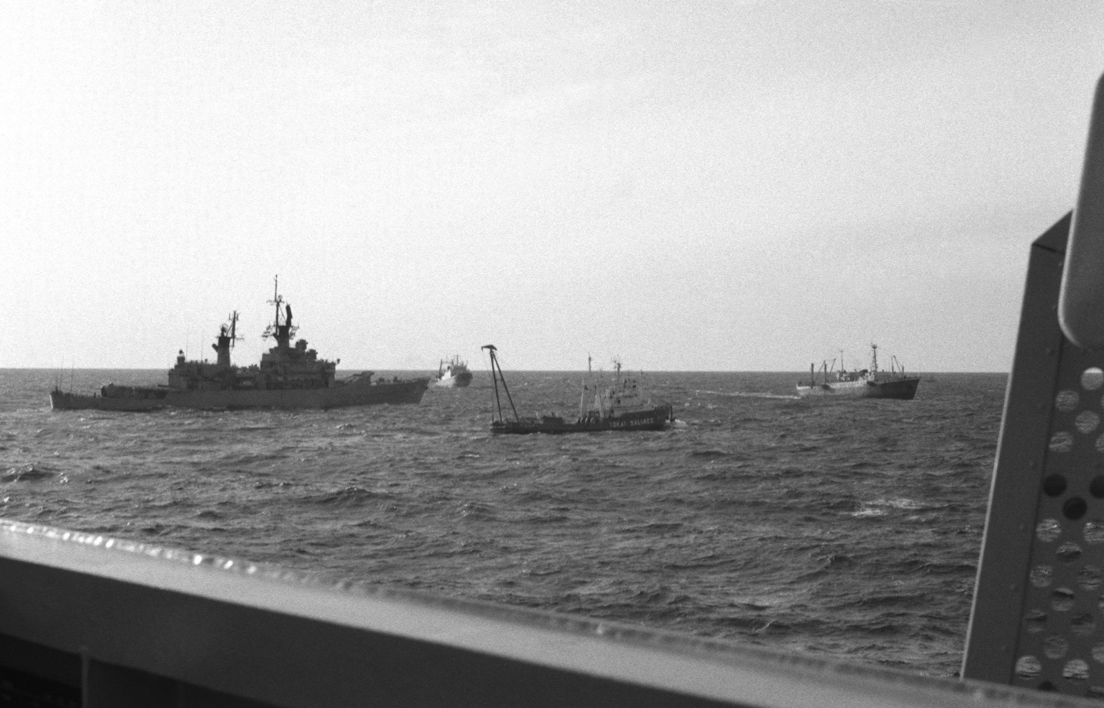 The guided missile cruiser USS STERETT (CG 31) and a Japanese salvage ...