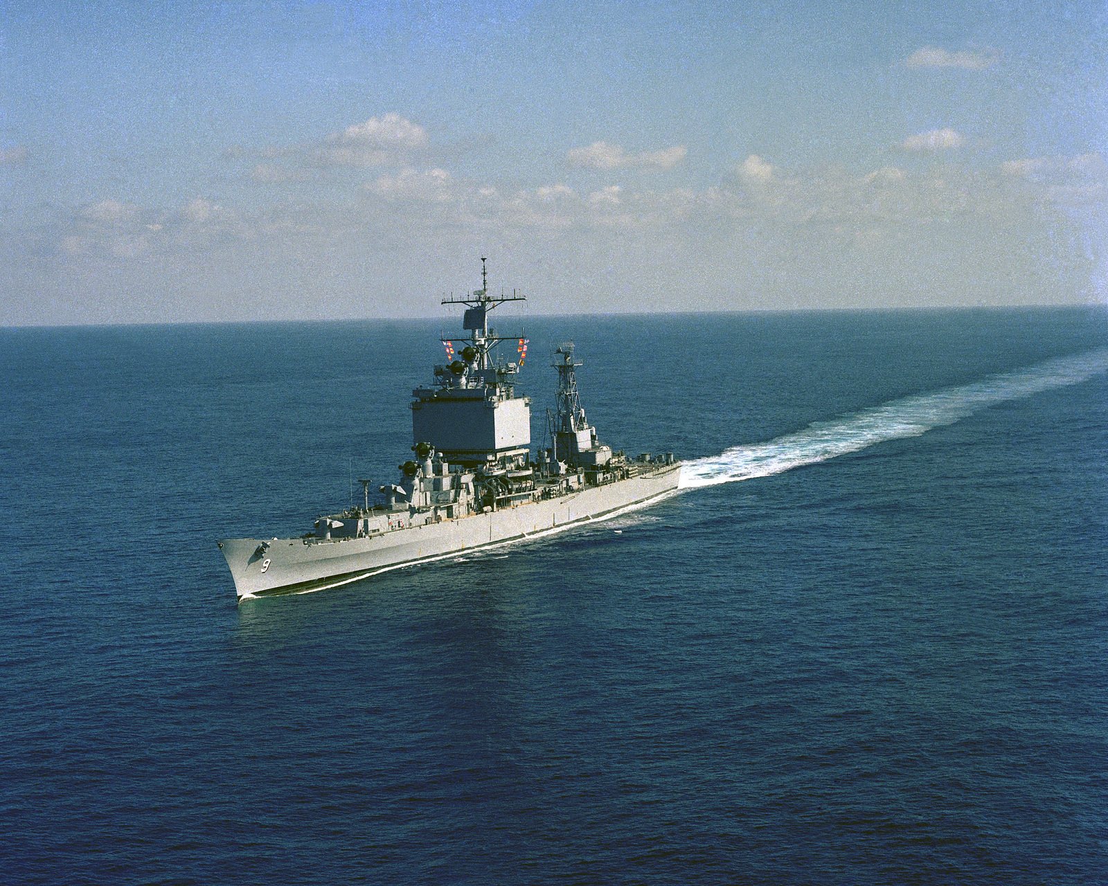 An aerial port bow view of the nuclear-powered guided missile cruiser ...