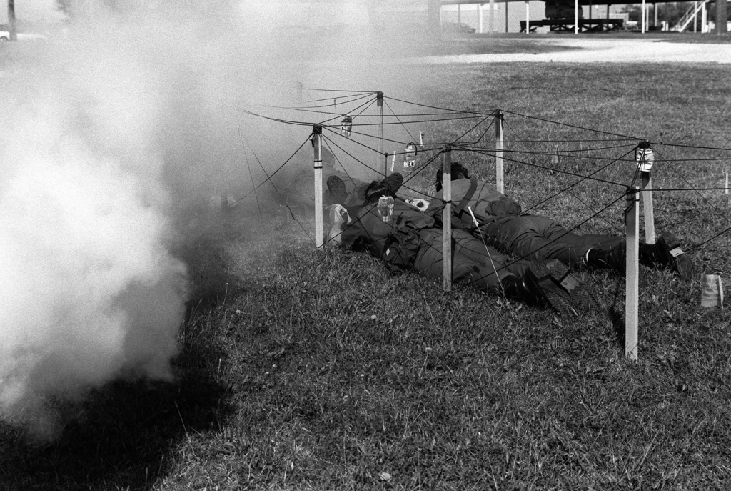 US Air Force clinic personnel maneuver a stretcherborne "casualty