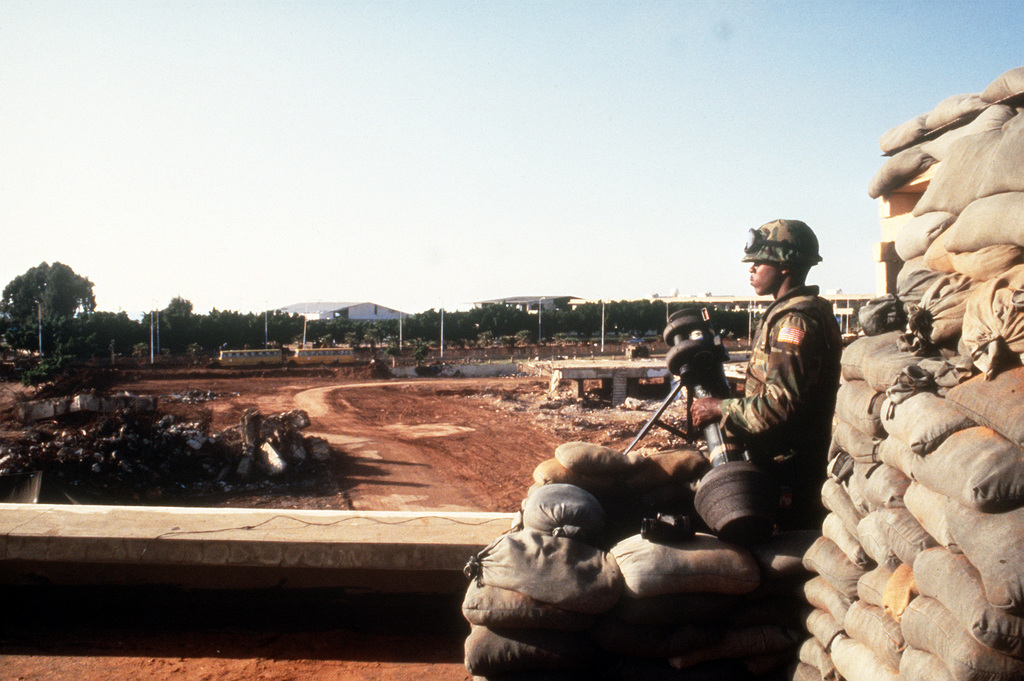 A Marine stands guard near the site of the Marine Battalion