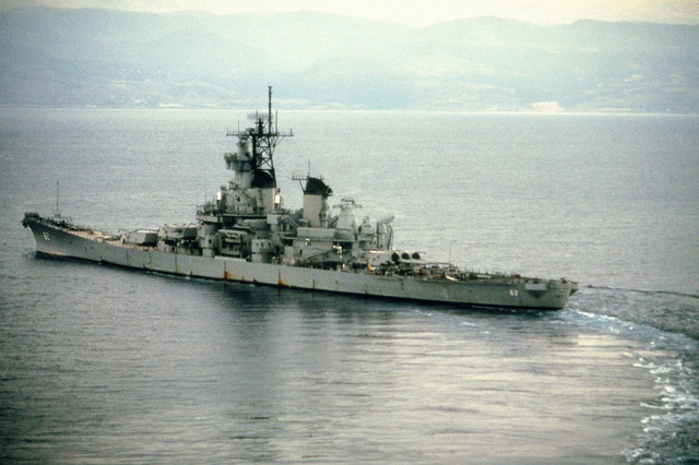 A port quarter view of the battleship USS NEW JERSEY (BB 62) underway ...