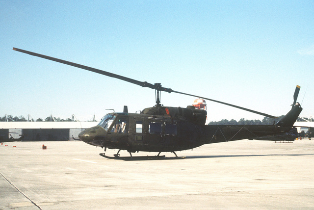 A Left Side View Of A Uh-1n Iroquois Helicopter From The Marine Light 