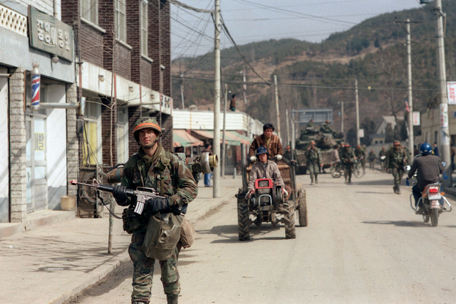 A member of the 2nd Battalion, 25th Infantry Division, (Orange Forces ...