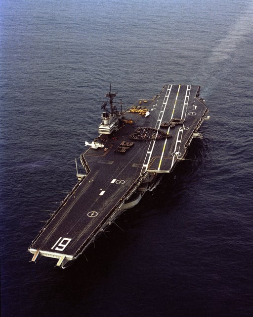 An aerial port bow view of the aircraft carrier USS RANGER (CV 61 ...