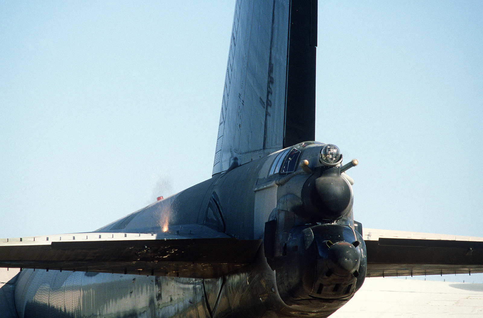 the-tail-of-a-b-52-stratofortress-aircraft-is-damaged-as-a-shell-is