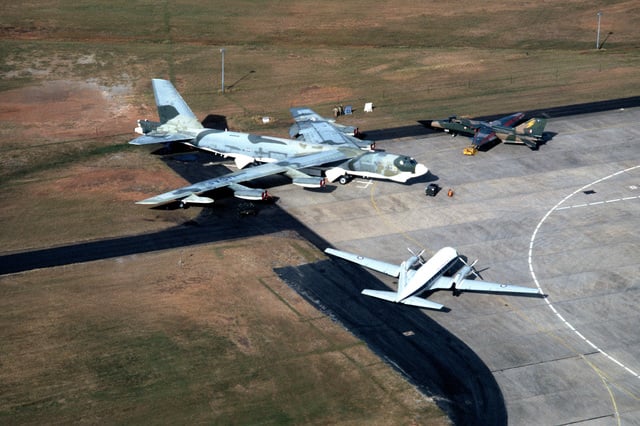 An Aerial View Of A US B-52 Stratofortress (left, Background), An ...