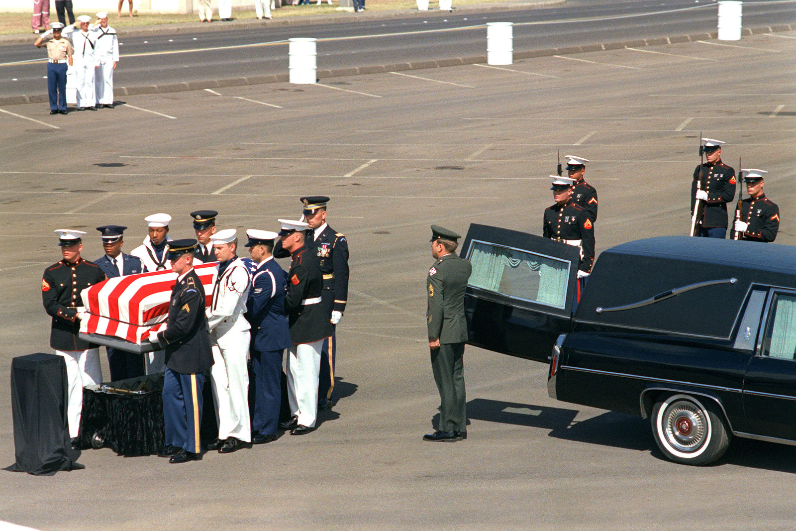 A joint services casket team places the casket of the Unknown ...