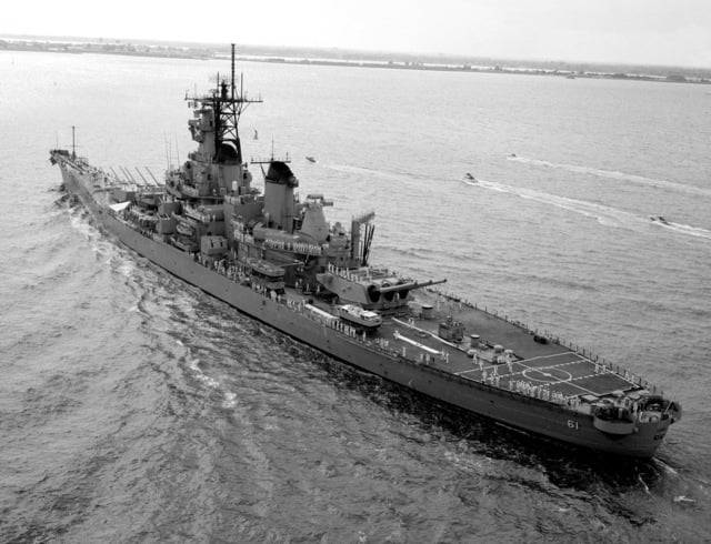 A port quarter view of the battleship USS IOWA (BB 61) arriving at ...