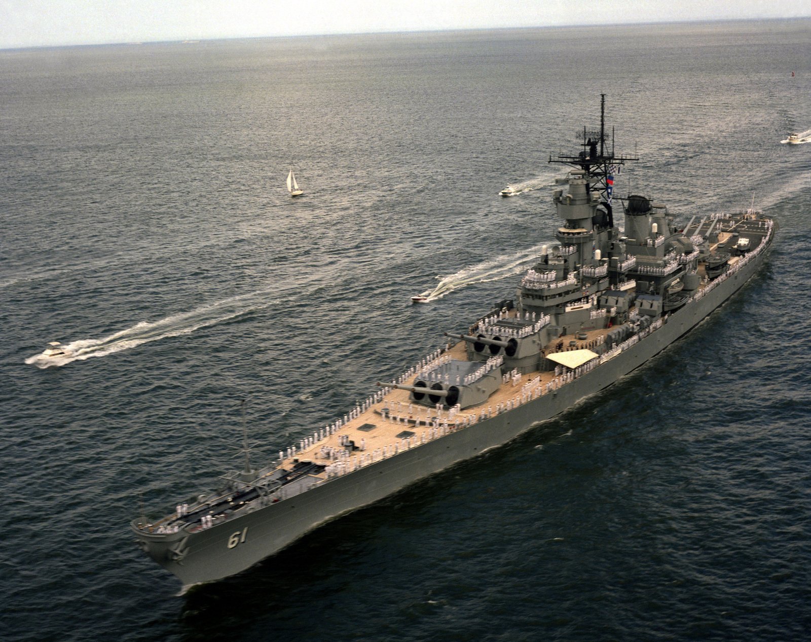 An elevated port bow view of the battleship USS IOWA (BB 61) arriving ...