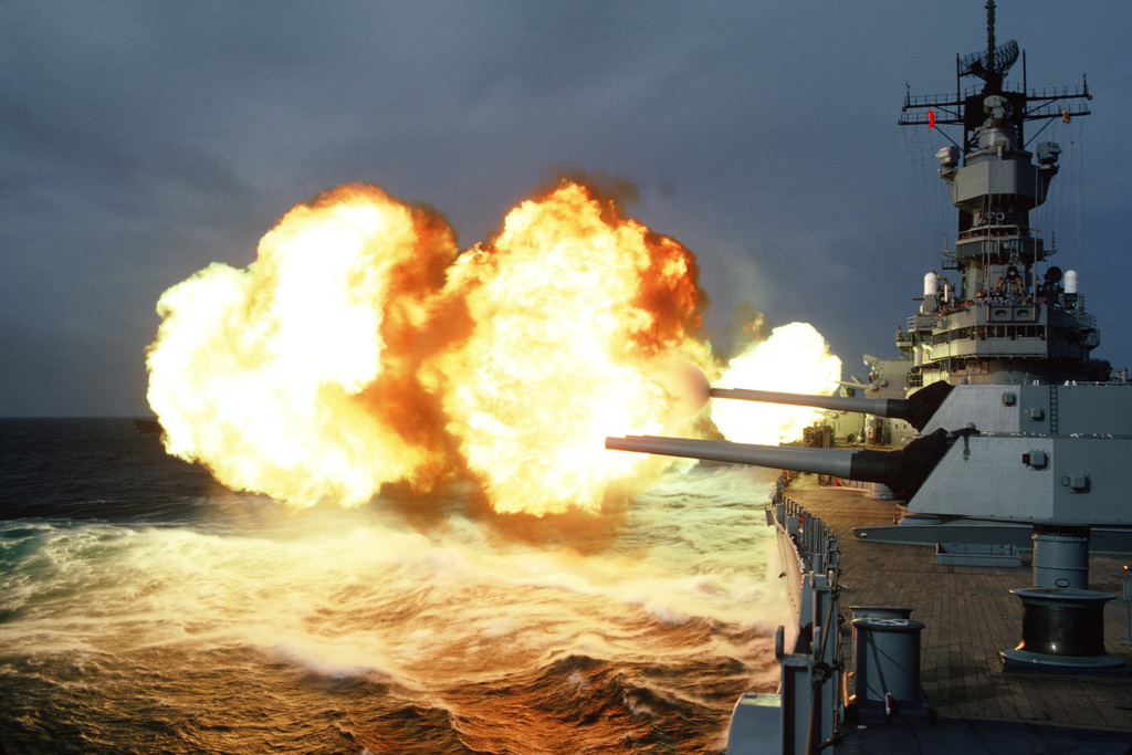 The 16-inch/50-caliber guns of the battleship USS IOWA (BB 61) are ...