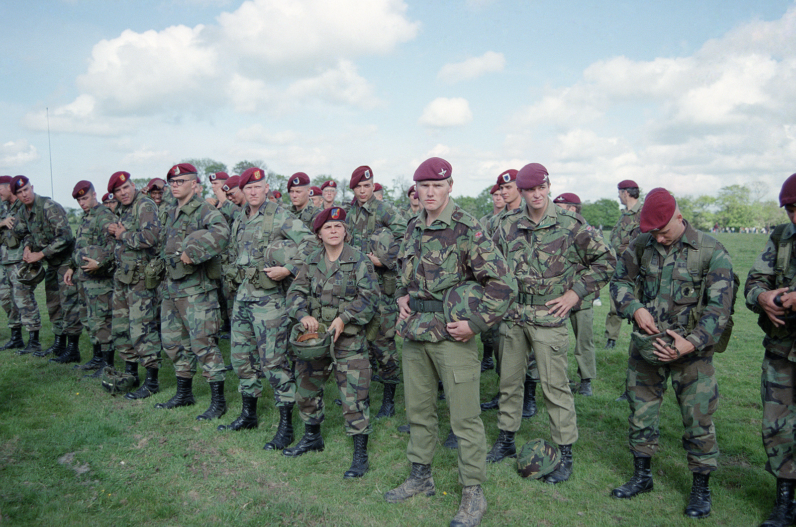 Members of the 82nd Airborne Division and British paratroopers stand in  formation prior to a jump during the 40th anniversary of D-day, the  invasion of Europe - NARA & DVIDS Public Domain