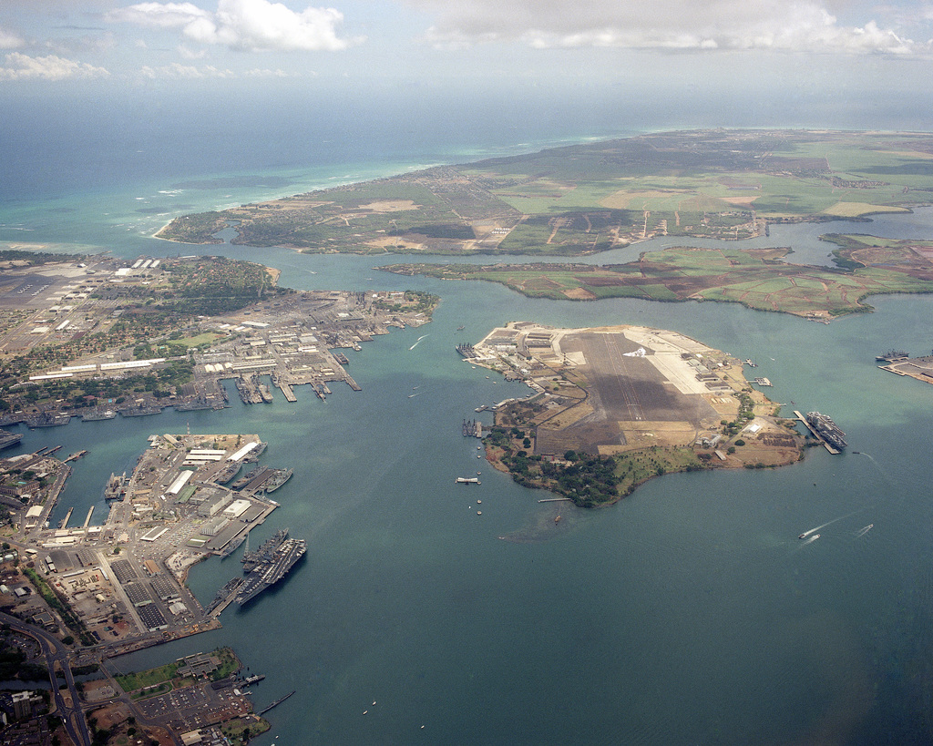 Aerial view of Pearl Harbor with the nuclear-powered aircraft carrier ...