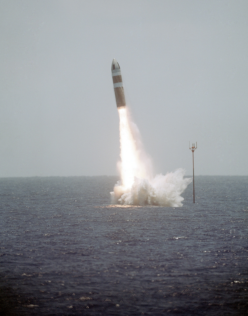 A UGM-73 Poseidon missile is launched from the nuclear-powered ...