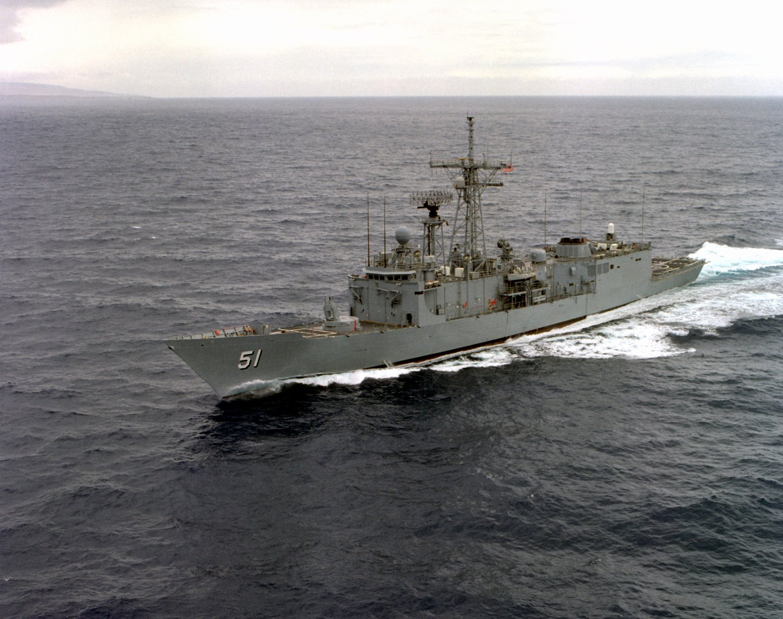 Aerial port bow view of the Oliver Hazard Perry Class guided missile ...