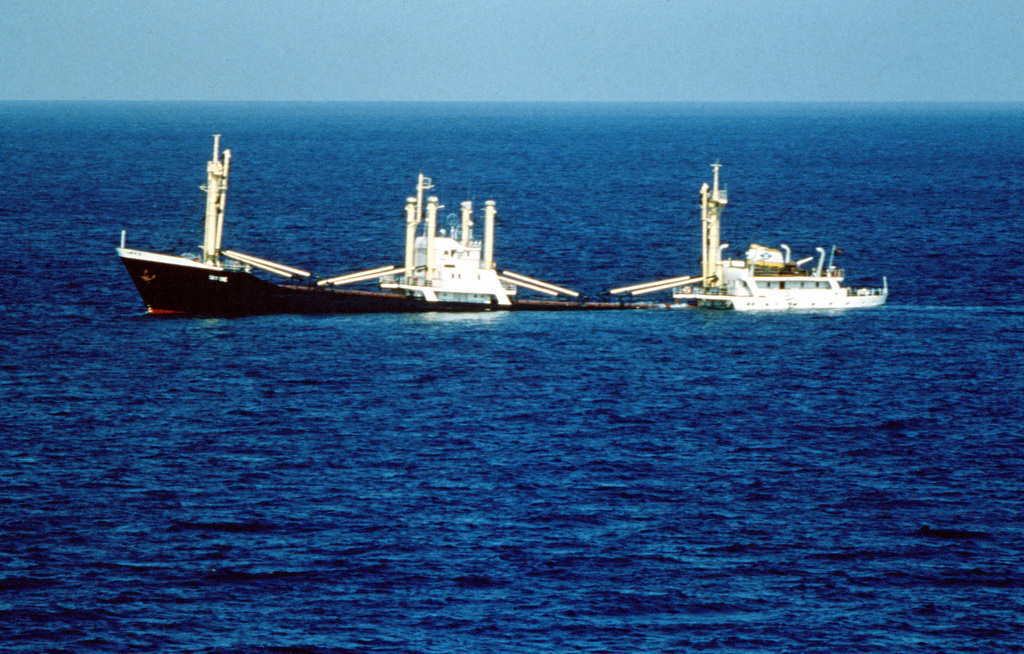 A port side view of the sinking Panamanian ship "SKY ONE". The tank