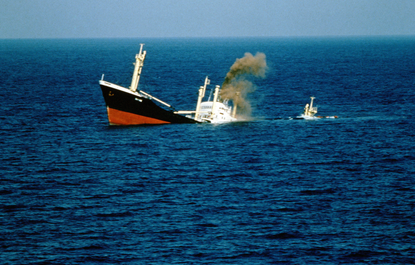 A port side view of the sinking Panamanian ship "SKY ONE". The tank