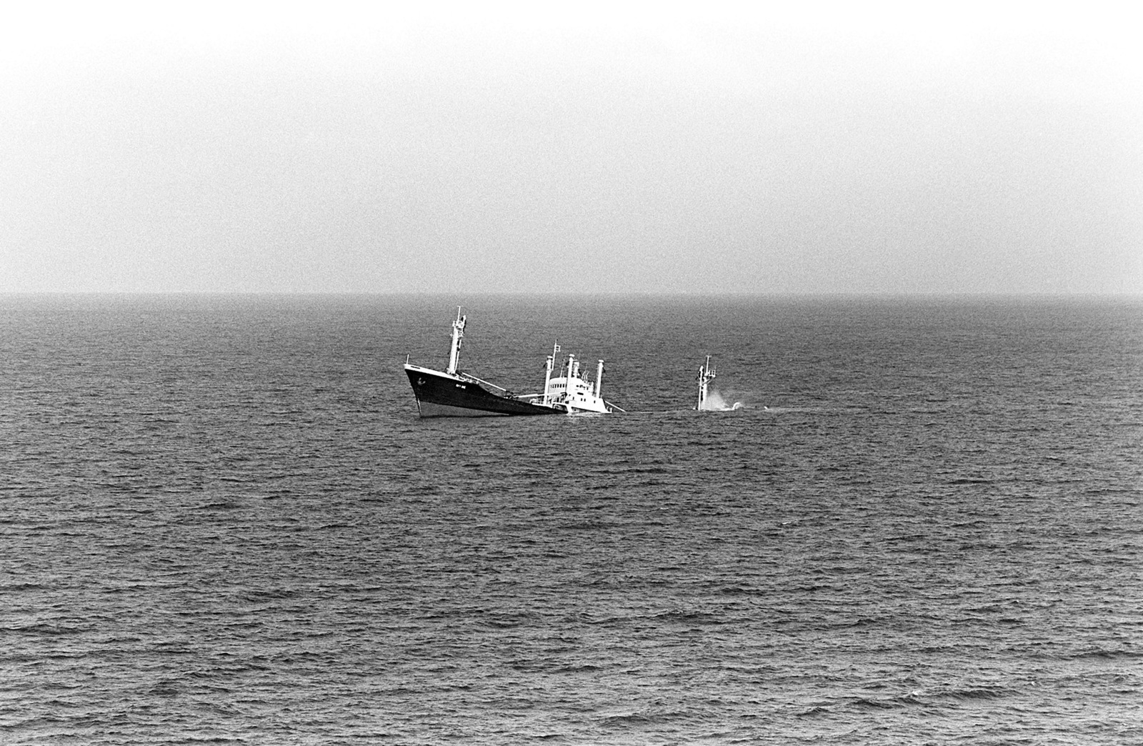 A port side view of the sinking Panamanian ship "SKY ONE,". The tank