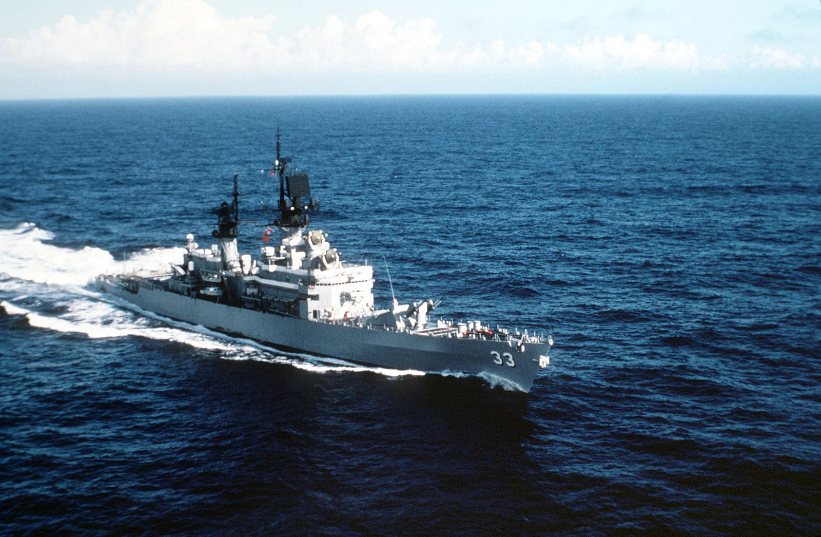 Aerial starboard bow view of the Belknap class guided missile cruiser ...