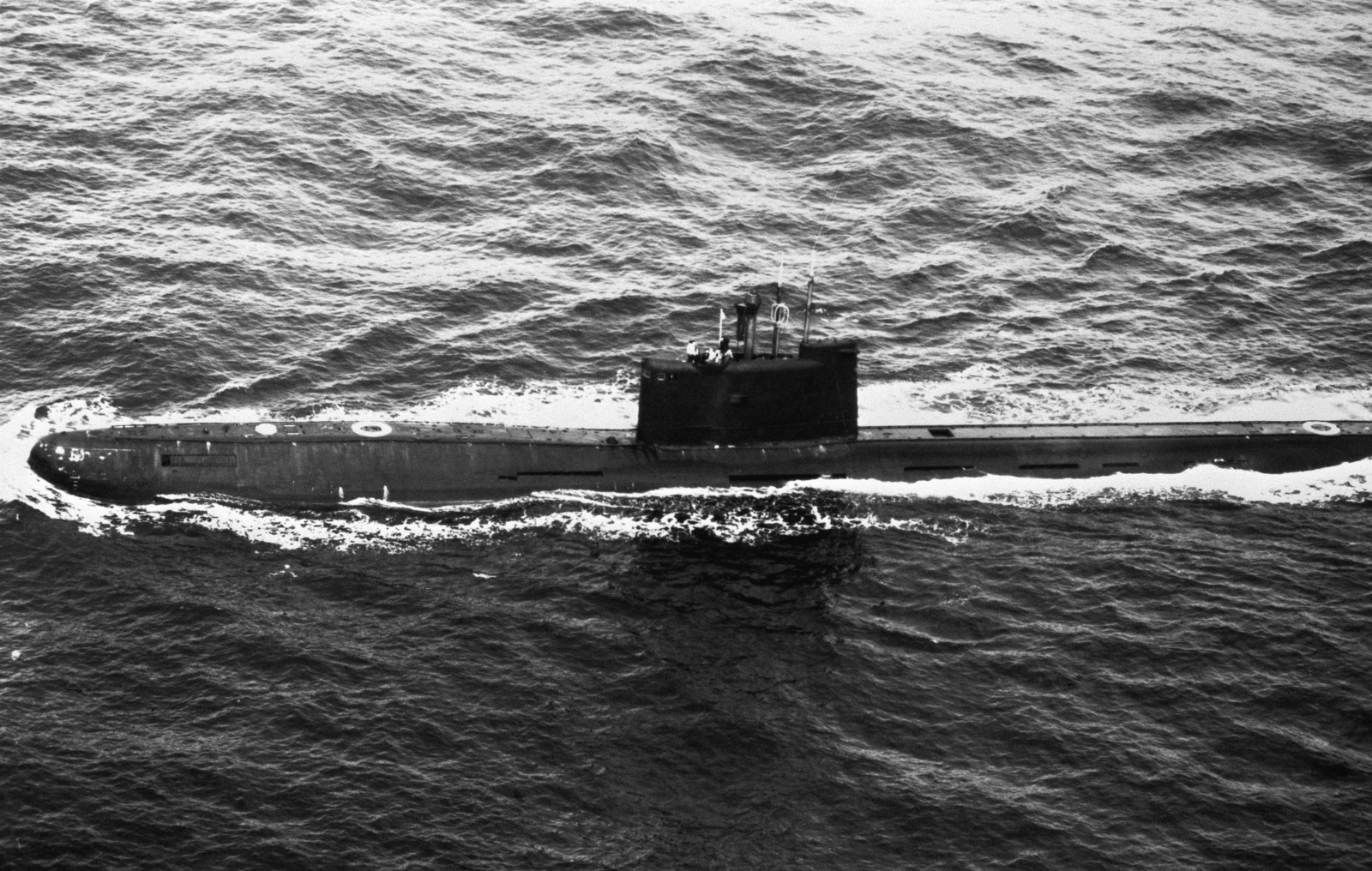 An aerial port beam view of a Soviet Tango class patrol submarine ...