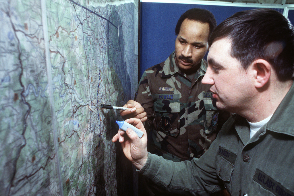 Members Of The 601st Tactical Control Wing Plot Positions On A Wall Map ...