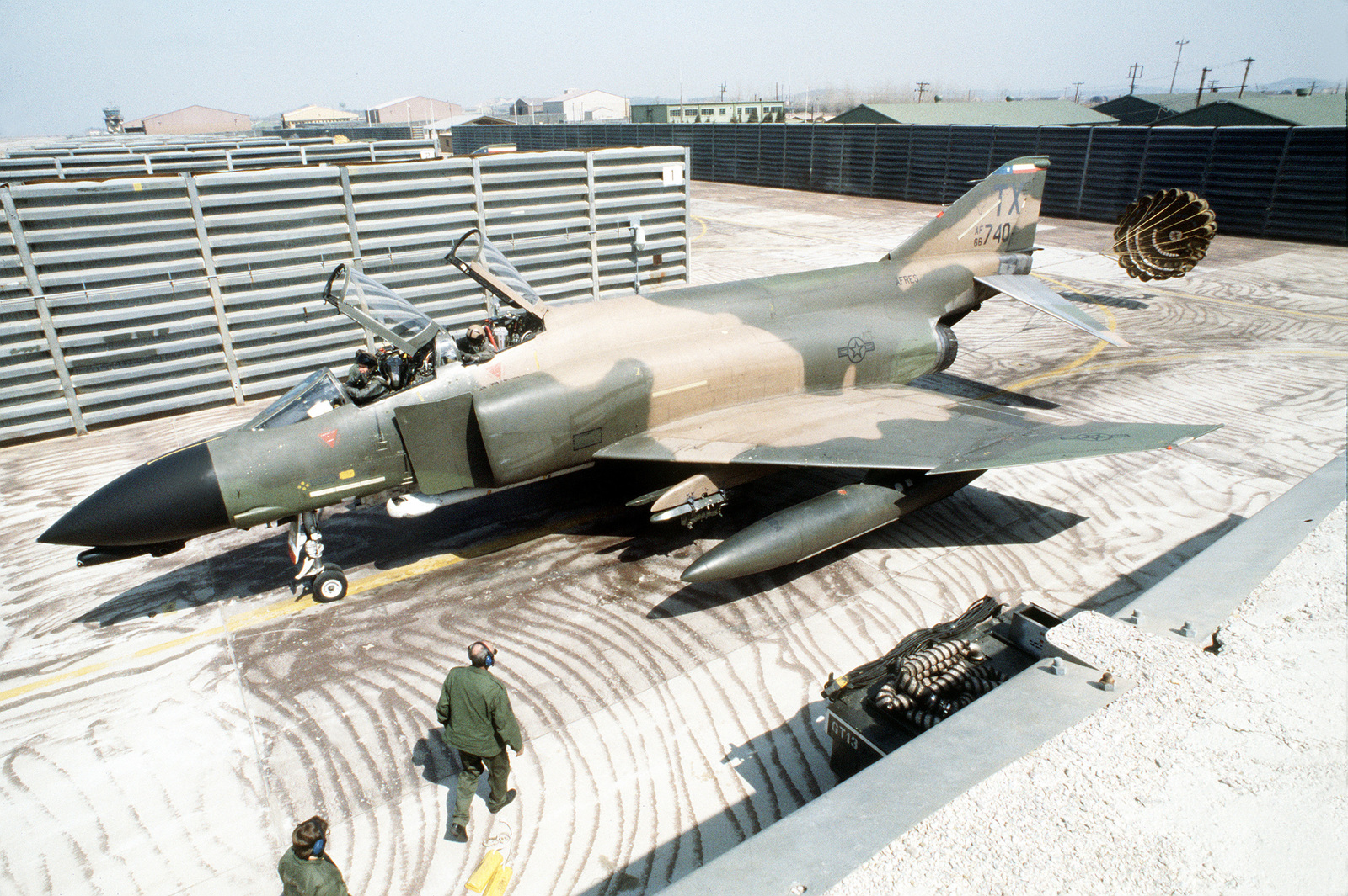 A 924th Tactical Fighter Wing F-4D Phantom II aircraft trails its drag ...