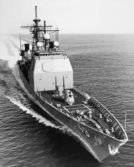 An aerial starboard bow view of the Ticonderoga class Aegis guided ...