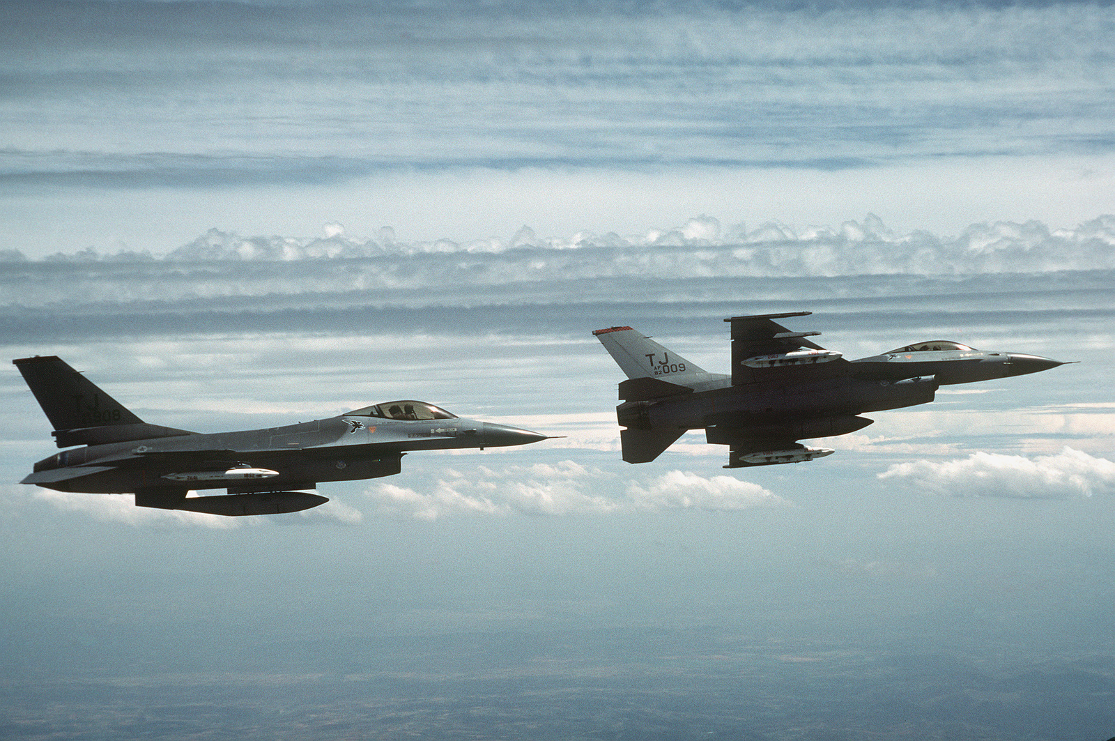 An Air-to-air Right Side View Of Two 614th Tactical Fighter Squadron F ...