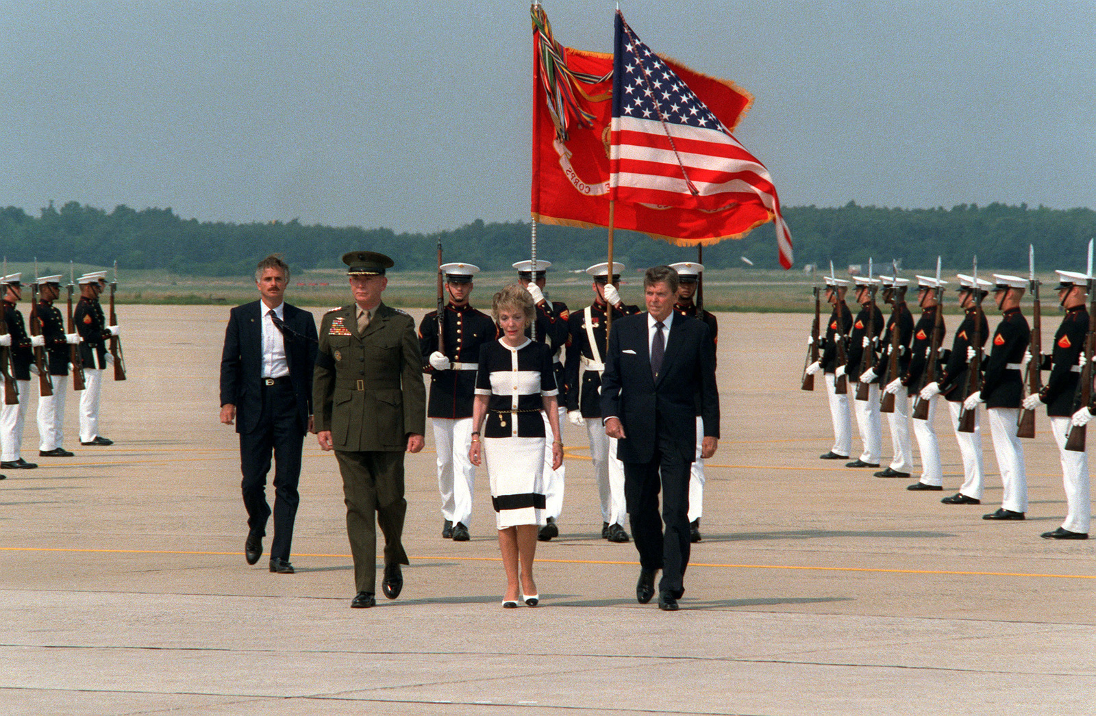 President And Mrs Reagan Accompanied By Commandant Of The Marine Corps General P X Kelley And A Color Guard Attend A Ceremony Upon The Return Of Four Marines Killed In El Salvador