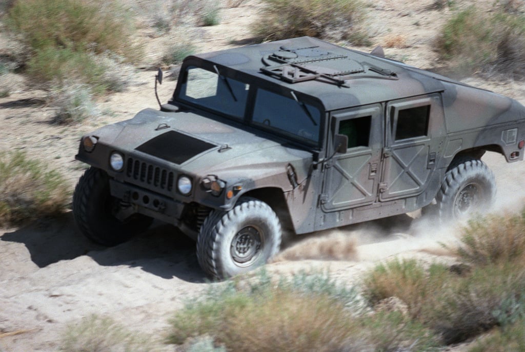 An M998 high mobility multipurpose wheeled vehicle at a testing site ...