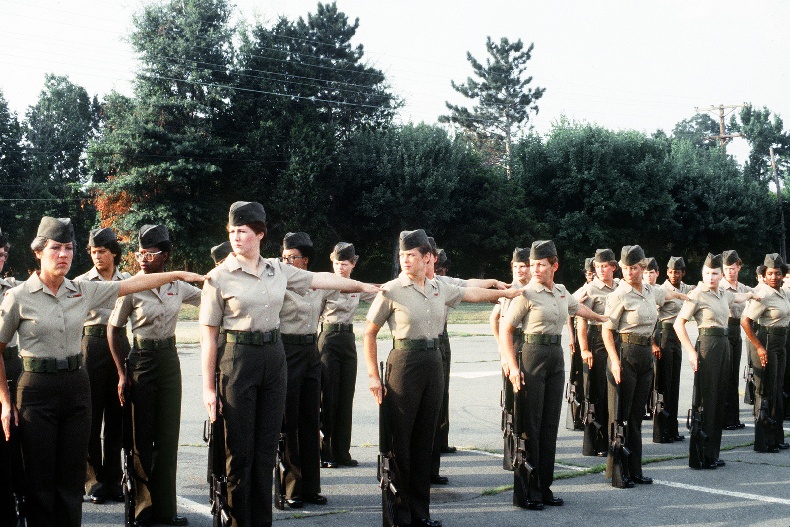 The Marine Corps First All Woman Drill Platoon Stands In Formation With