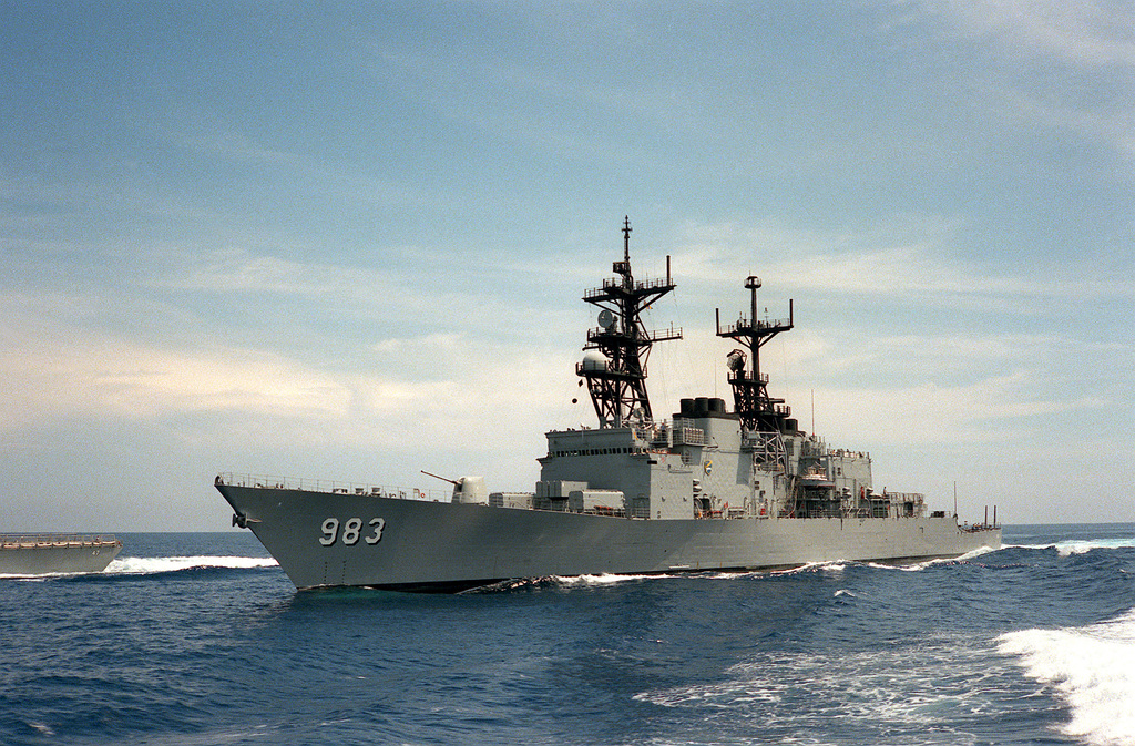 A port bow view of the destroyer USS JOHN RODGERS (DD-983) underway ...