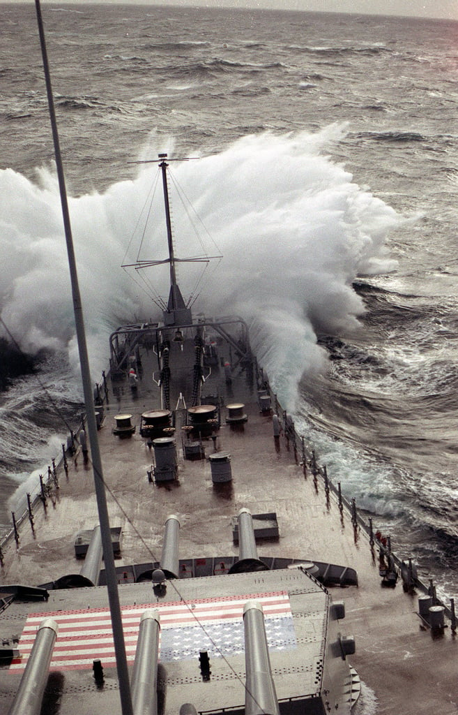 The Battleship USS IOWA (BB-61) Takes Water Over The Bow While Underway ...