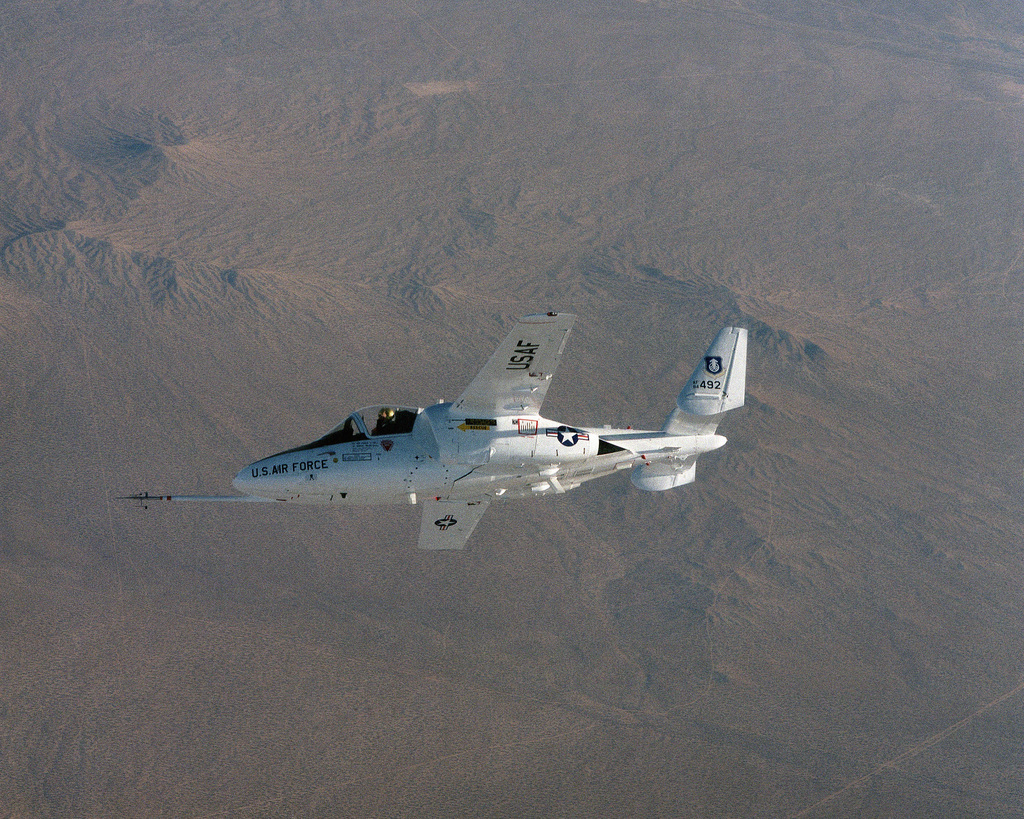 An Air-to-air Left Side View Of A T-46A Aircraft Over Edwards Air Force ...