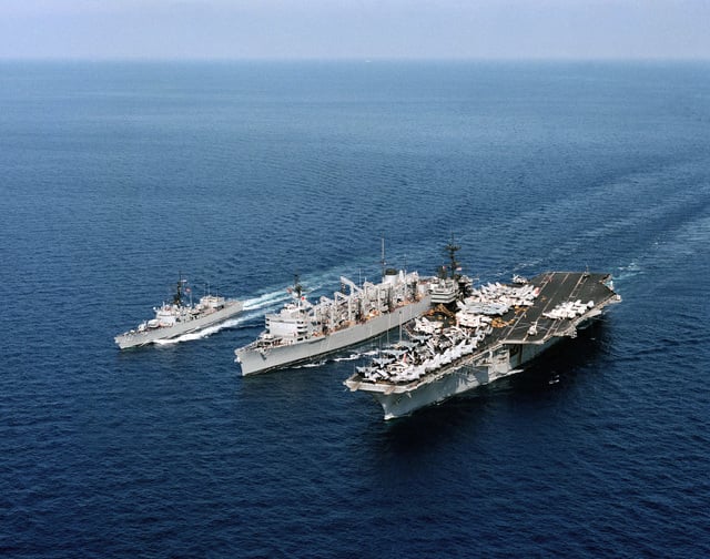 An elevated port bow view of the aircraft carrier USS SARATOGA (CV 60 ...