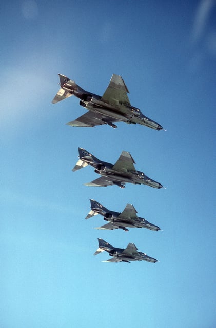 An air to air right underside view of four 37th Tactical Fighter Wing F ...