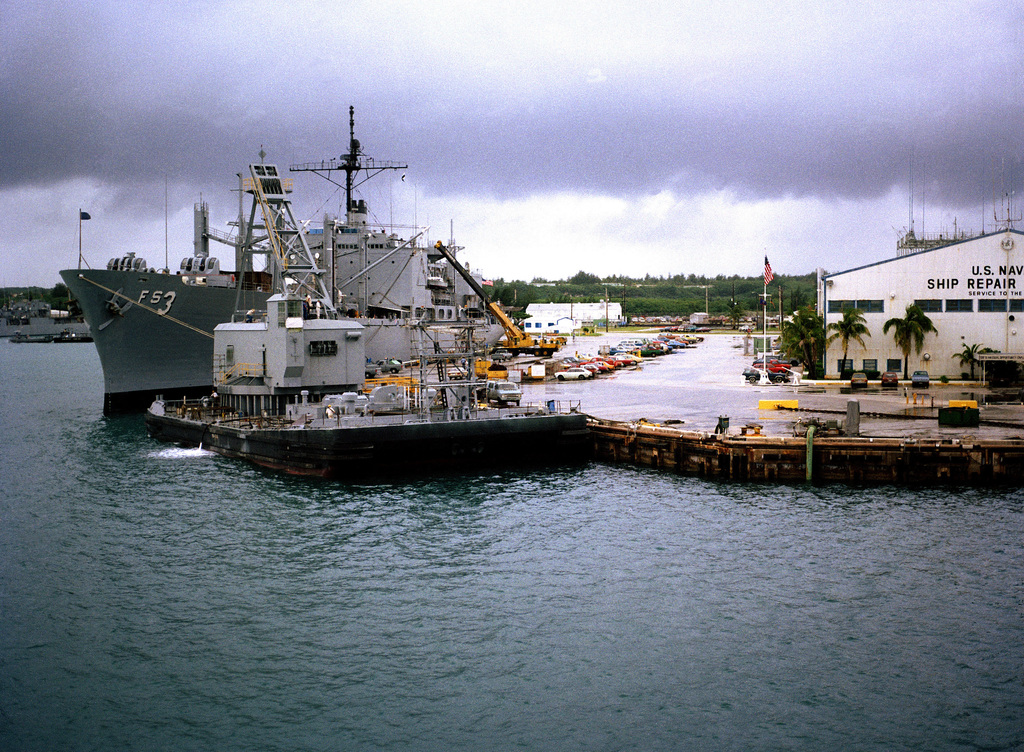 A View Of A Section Of The Us Naval Ship Repair Facility With The Combat Stores Ship Uss Niagara