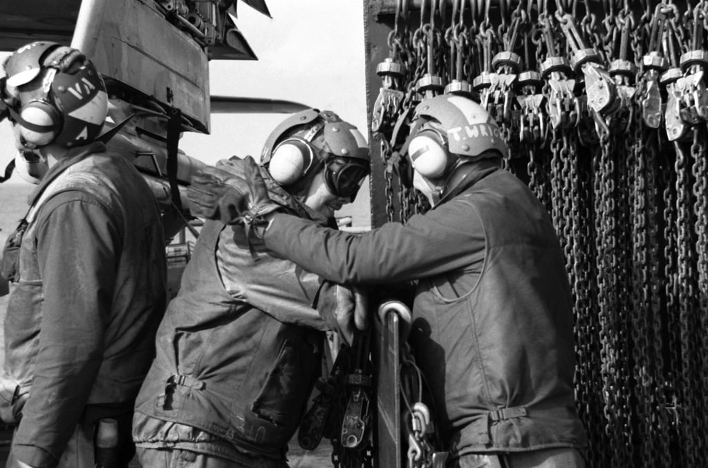 flight-deck-crewmen-aboard-the-aircraft-carrier-uss-coral-sea-cv-43