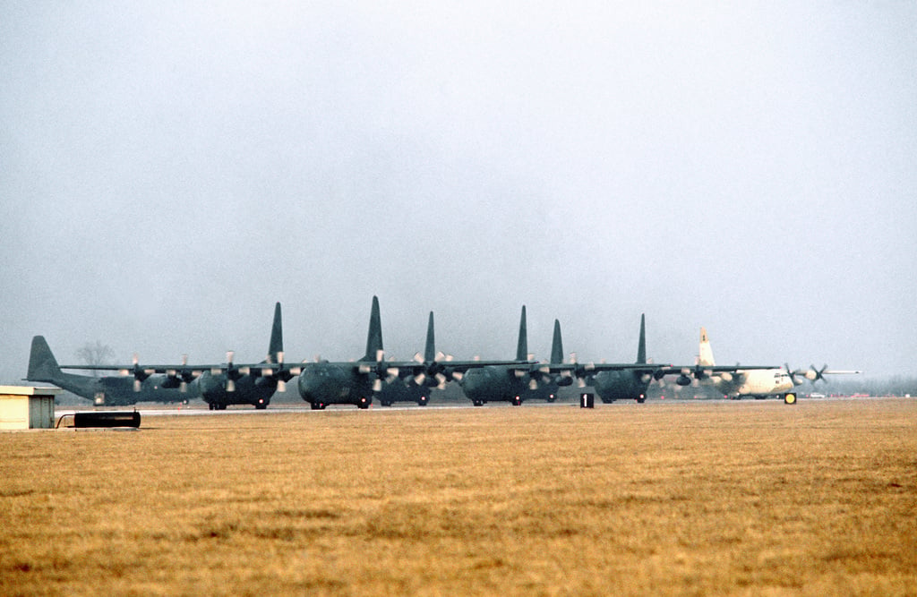 C-130e Hercules Aircraft Of The 37th Tactical Airlift Squadron Taxi On 